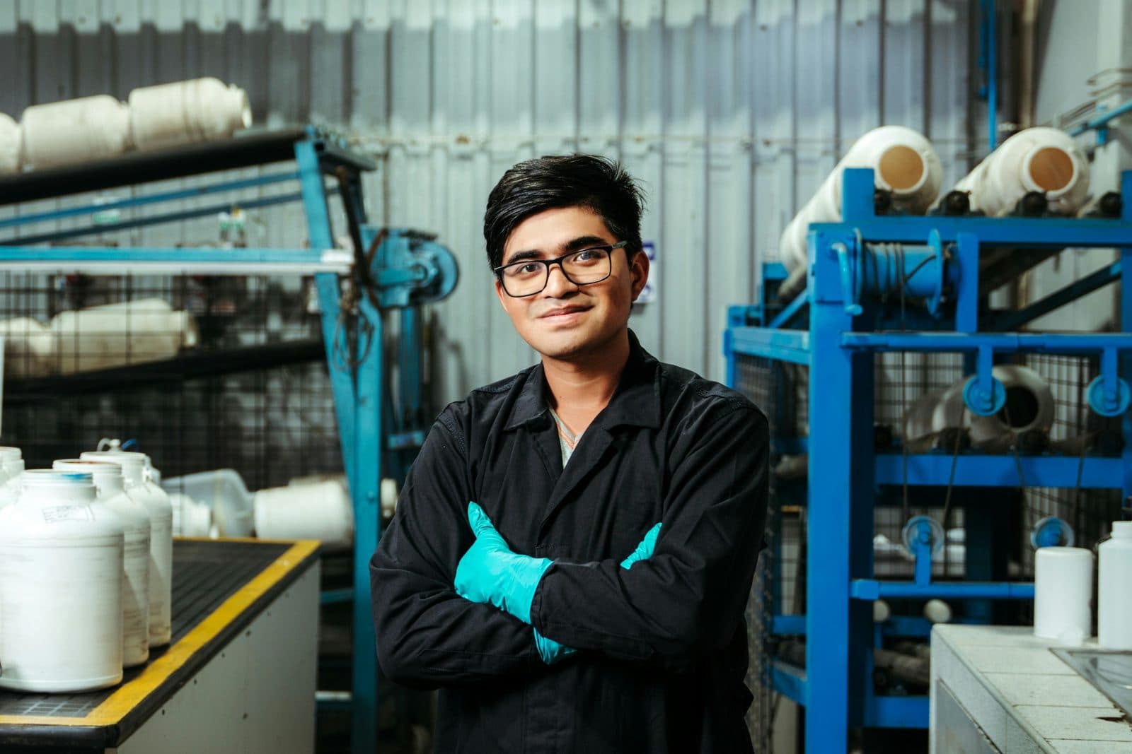 Smiling production worker on the factory floor